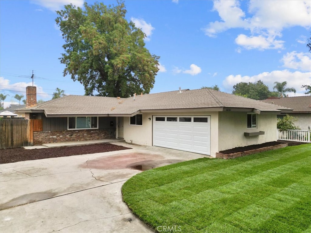 Newly Remodeled Single-Story in a Beautiful Tree-Lined Neighborhood! This updated 3-bedroom, 2-bath home offers 1,141 square feet of comfortable living along with a large 8200+ square foot lot, ideal for first-time buyers, downsizers, or anyone looking for the convenience of single-level living. Located on a peaceful, tree-lined street, the setting is calm and welcoming. Step inside to find fresh interior paint, brand-new dual-pane windows, and durable, low-maintenance vinyl plank flooring throughout. The remodeled kitchen features quartz countertops, a new stove, sink, and dishwasher, and opens to the family room, making it perfect for both everyday living and entertaining. The front yard has been newly landscaped with a lush green lawn and sprinkler system. The backyard offers plenty of room to dream; whether you’re imagining a pool, a garden, space to play, potential RV parking or even an ADU. Additional features include central heat and air, laundry hookups in the attached two-car garage, and plenty of off-street parking. You’re just minutes from Riverside Plaza, Magnolia Center, and a variety of local restaurants, shops, and family-friendly spots like Cold Stone Creamery, with easy access to everyday essentials and weekend fun. If you’ve been looking for an affordable, clean, remodeled turn-key home in a convenient location, this one checks all the boxes. Come take a look; this is one you don’t want to miss.