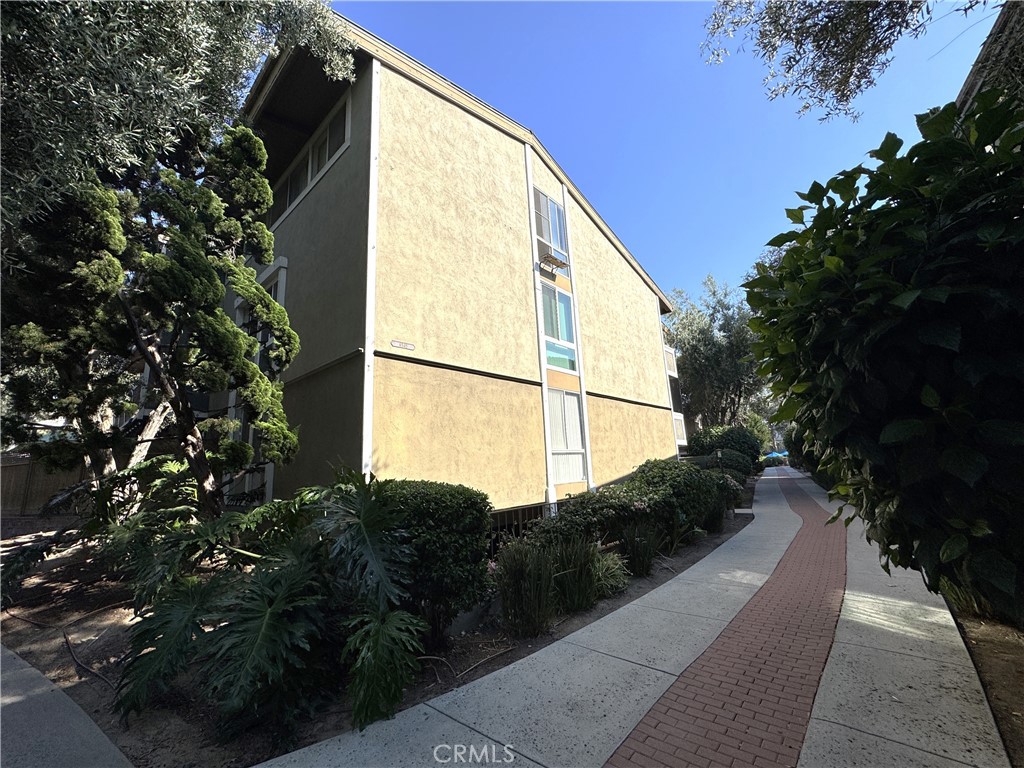Make this spacious 2 BD 2 BA condo in Culver City your new home! This 2 bedroom, 2 bath, ground floor unit features beautiful laminate floors, a cozy fireplace, a private side yard, and two wall air conditioning units in the 1300+ sq ft condo. The kitchen comes equipped with a refrigerator, dishwasher, stove, and microwave.
The primary bedroom has an en-suite bathroom, floor to ceiling windows, and a roomy walk-in closet. Two parking spaces are included. The home is nestled in a gated tree-lined community with access to countless amenities. Relax at one of the 3 sparkling blue pools, spa, clubhouse, pool hall, or banquet room. Enjoy an active lifestyle at the tennis courts, putting green, and gym. Children can enjoy the playground and Montessori school on the grounds. Convenient to the 405 and 90 freeways, Fox Hills Mall, and downtown Culver City.