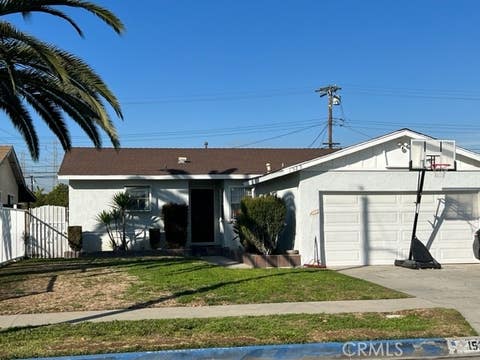 Photo of 1529 S Mckinley Avenue, Compton, CA 90220 (MLS # PW23027711)