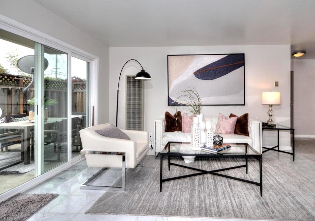 Step into this beautifully renovated home where modern finishes and open spaces seamlessly blend indoor and outdoor living, creating the perfect setting to embrace the California lifestyle. The generous living room, featuring marble flooring and sliding glass doors leading to a secluded patio, offers a fluid transition between the open indoor and outdoor spaces. The updated kitchen boasts marble countertops, a breakfast bar, newer appliances, and inviting white cabinets, complemented by the adjacent dining area, both adorned with marble flooring. The updated bathrooms with tile flooring and the tranquil Primary Bedroom Suite provide a peaceful retreat. With dedicated garage parking, a community pool, and a large guest parking area, this home offers both convenience and comfort. Ideally situated just minutes away from the Hillsdale Shopping Center and the vibrant Downtown San Mateo, residents can enjoy easy access to an array of amenities including restaurants, parks, and convenient commute routes, making this home a true gem in the heart of San Mateo. Would you like to proceed with crafting a social media post to showcase this stunning home to potential buyers in the San Mateo area?