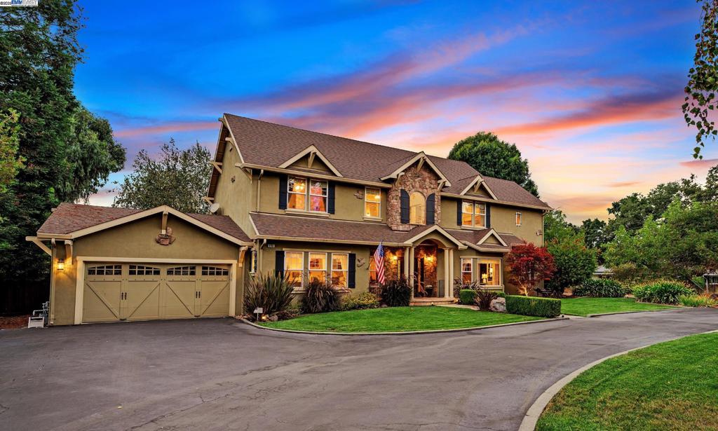Experience the perfect blend of luxury living and country charm close to Downtown Pleasanton and adjacent to the prestigious Callippe Preserve Golf Course. This exceptional estate showcases a beautifully updated main residence, detached guest house, 13x35 covered RV storage, and multiple outbuildings with plenty of storage. Designed for entertaining and everyday living, the main home features a gourmet kitchen with professional appliances, large island, custom cabinetry, spacious pantry, and a wine room with wrought-iron detail. The inviting family room centers around a grand fireplace, while the expansive primary suite offers a private lounge, spa-like bath, and generous walk-in closet. Step outside to your private resort with a sparkling pool, heated pergola, and outdoor kitchen. Additional amenities include a 2-stall barn, riding arena, multiple garages, workshop, storage and so much room to expand the house or add additional structures. The charming guest house provides comfort and privacy. The zoning allows for either two horses or two large animals, if you choose. Enjoy amazing sunsets from this beautiful oasis.