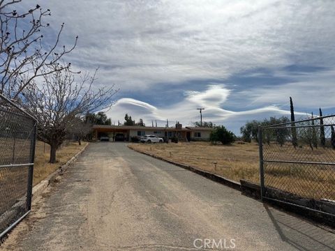 Photo of 11507 Savage Ln, Apple Valley, CA 92308 (MLS # HD26067443)