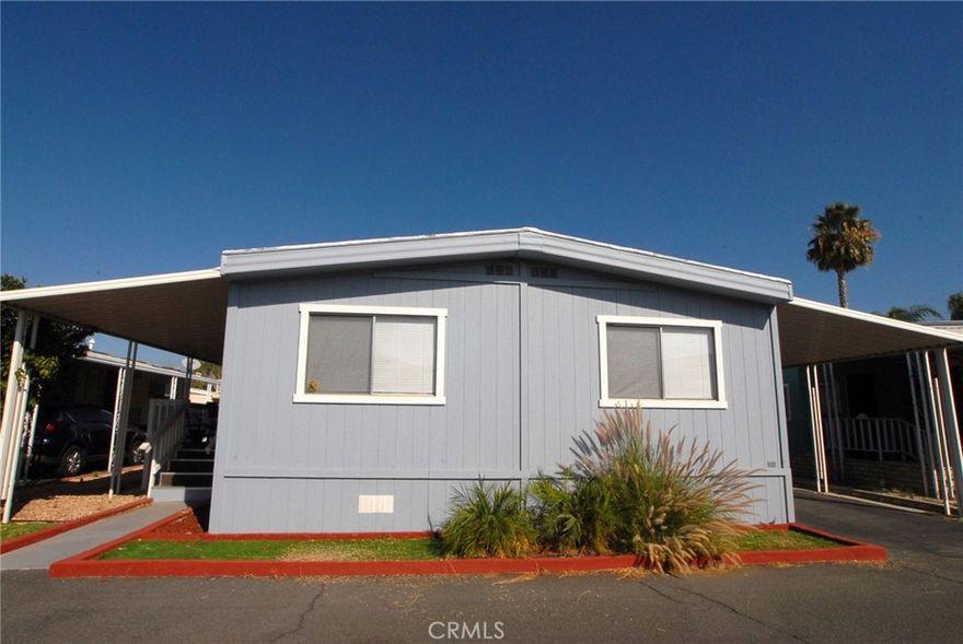 55 + Securely Gated, Scenic, Community of Casa Del Rey. FOR LEASE 3bed/2Bth. Well maintained 1,440 sq. ft. Family room, dining room, living room and kitchen with a large island and all stainless steel appliances. Washer & dryer included. Light laminate plank flooring through out with carpet in the bedrooms. Large front porch, 2 large sheds and a mature grapefruit tree in the back yard. Two car carport parking. 

Park offers swimming pools, indoor jacuzzi, clubhouses, barbecue area, exercise room, TV room and more.
