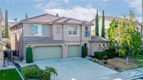 Photo of 7585 Shadyside Way, Eastvale, CA 92880 (MLS # TR26201254)