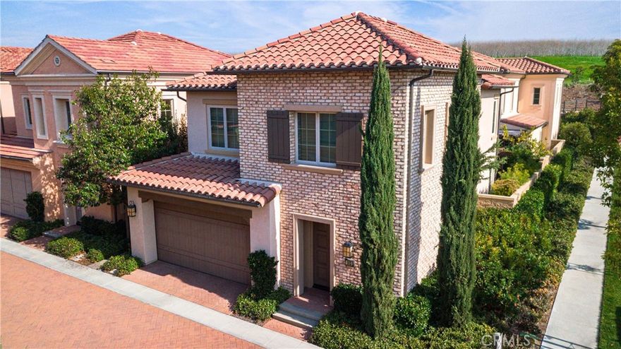 This gorgeous, like-new home is located in the beautiful Laguna Altera guard-gated community. The unique end-unit location makes this beautiful home bright and welcoming,  and provides your guests with easy access to the unit. The Tuscan elevation of Siena Collection Residence 2, originally built by Irvine Pacific, features 3 bedrooms and 2.5 bathrooms with hardwood floors throughout the main floor and many other upgrades, including crown molding, recessed ceiling lighting, stainless steel kitchen appliances, limestone flooring in the master bath, and stunning Brick design in the exterior. Award-winning Irvine school district, including University High School. Beautiful views from upstairs rooms. Paved trails are just a few steps from the front door. The association amenities include a pool, spa, and sports court. The beautiful beaches of Laguna, Irvine Spectrum, and all they have to offer are just a short drive away.  Conveniently close to many freeways, making your commuting so very convenient.

PLEASE NOTE: The property is unfurnished, and furniture is not  included.