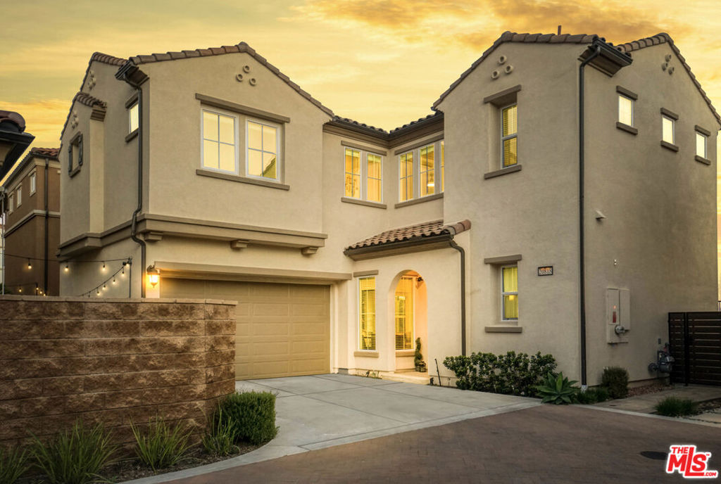 Located in the exclusive, guard-gated community of The Canyons, this beautifully upgraded home with stunning CITY and MOUNTAIN VIEWS blends luxury, comfort, and modern convenience in a thoughtfully designed layout. The open-concept main floor features a grand foyer, expansive great room, and a chef's kitchen equipped with quartz countertops, a large center island, wall-to-wall cabinetry with upgraded handles and premium stainless-steel appliances, including a gas range, oven, dishwasher, and trash compactor. A guest bedroom and full bath on the main level offer added flexibility. Upstairs, a sleek modern staircase leads to a spacious loft ideal as a family room, home office, or play space alongside two additional bedrooms, a shared bath, and a full laundry room. The oversized primary suite serves as a private retreat with dual vanities, a soaking tub, a glass-enclosed shower, and a large walk-in closet. Additional highlights include solar system, tankless water heater, recessed lighting through out, window treatments. Step outside to the beautifully designed backyard oasis, where you can relax or entertain while enjoying sweeping city lights and mountain views perfect for evening gatherings or quiet mornings.. Community amenities include 24-hour security, a resort-style clubhouse with pool and spa, cabanas, BBQ area, splash pad, and scenic hiking trails all minutes from top-rated schools, upscale shopping, fine dining, and major freeways. Don't miss this rare opportunity to live in a stunning home in one of the area's most sought-after neighborhoods.