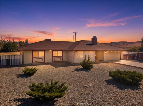 Photo of 20971 Thunderbird Road, Apple Valley, CA 92307 (MLS # CV26188432)