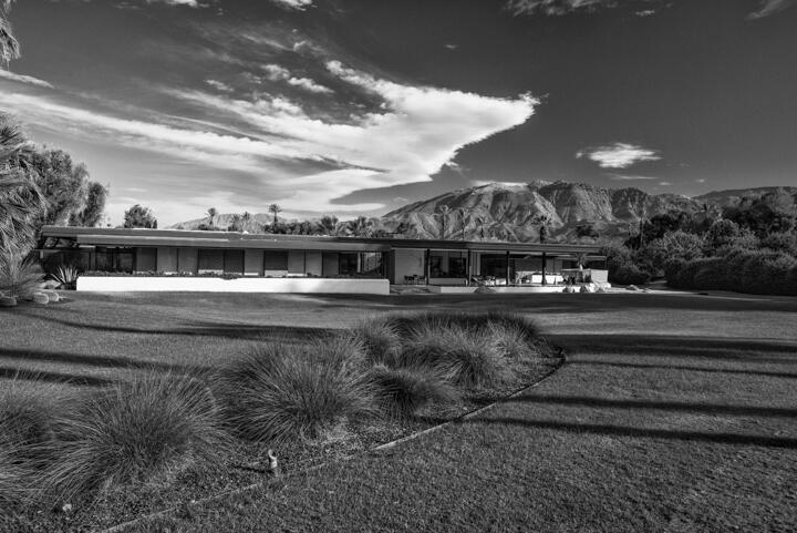 With sensational mountain and golf course views from its privately gated 3-acre setting within Rancho Mirage's storied and prestigious Thunderbird Country Club, this legendary Mid-Century Modern masterpiece presents a once-in-lifetime opportunity. Built for Belgian Ambassador Leonard Firestone of Firestone Tires, the sprawling Firestone Estate melds walls of glass, steel-beam construction and appreciated privacy into a sublime setting. The residence has been faithfully and painstakingly restored inside and out to showcase the talents of renowned architect William Pereira, whose portfolio includes the futuristic Theme Building at LAX and San Francisco's Transamerica Pyramid. With 5 bedrooms and 6.5 baths in nearly 7,280 square feet, the open and airy single-level design displays frameless floor-to-ceiling windows, walls of slide-away glass, luxurious guest accommodations, and an impressive entrance with glass and metal doors. A private courtyard encourages fun and relaxation with a pool and spa, a reflecting pool amplifies the beauty of fairway and San Jacinto Mountain vistas, and the tennis court welcomes memorable matches.