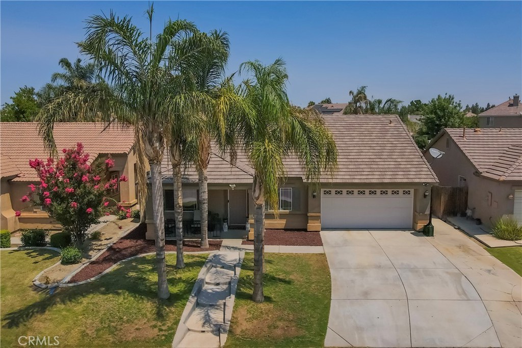 Welcome to this spacious and beautifully maintained single-story home located in a highly desirable Southwest Bakersfield neighborhood! Offering 3 bedrooms, 2 bathrooms, and a bonus studio/office, this home provides over 1,800 sq ft of living space with a layout designed for both comfort and functionality. As you step inside, you'll be greeted by high ceilings and an open-concept design that creates an airy and welcoming atmosphere. The family room features a cozy fireplace and flows seamlessly into the bright kitchen and dining area—perfect for entertaining and everyday living. The kitchen includes ample cabinetry, tile countertops, a pantry, and a breakfast nook.
Enjoy the convenience of an indoor laundry room and an attached two-car garage. The additional studio/office space is ideal for remote work, a guest room, or a creative space. Step outside to your private backyard oasis complete with a sparkling in-ground pool, a tranquil waterfall feature, and a covered patio—ready for summer gatherings and outdoor enjoyment. This home is situated near excellent schools, shopping, dining, and commuter routes. No HOA. Don't miss this opportunity to own a move-in ready home with a pool in a fantastic location! Schedule your private showing today!