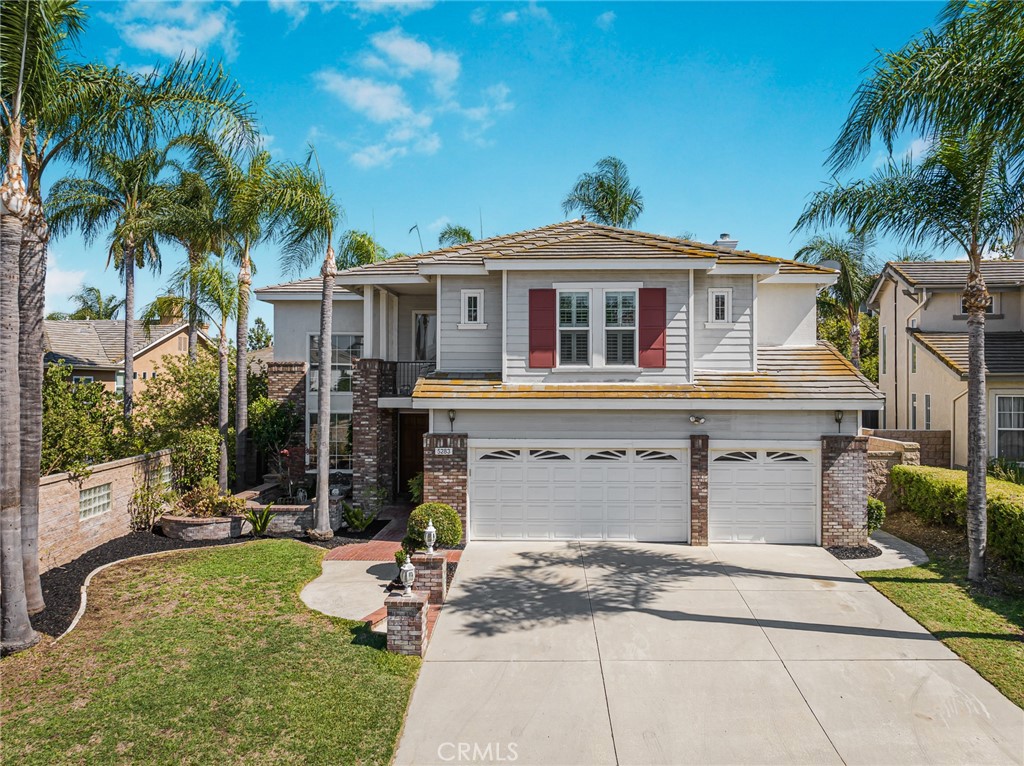 Set on a generous 10,350 square foot lot in one of Chino Hills’ most sought-after neighborhoods, this 5-bedroom, 4.5-bathroom residence offers 3,314 square feet of spacious, well-balanced living. Double entry doors open into a grand living room with soaring ceilings that immediately create a sense of scale and elegance.
The layout is thoughtfully designed to feel both open and functional. A full downstairs suite provides comfort and privacy for guests or extended family. The family room features a fireplace, mini bar, and flows seamlessly into the kitchen. The totally upgraded kitchen has granite countertops, center island, ample cabinetry offers both style and utility, stainless-steel appliances, including large built-in refrigerator, Thermador built-in microwave, oven, food warmer, and 6-burner cooktop.
Upstairs, a spacious loft provides the perfect setting for family entertainment. The large primary suite has walk-in closet, fireplace, and overlooks the beautifully landscaped backyard and offers a peaceful retreat. Primary bathroom with dual vanities, bathtub and separate shower.
Other features include: Fresh interior paint throughout gives the home a clean, updated feel. Ceiling heights upstairs remain impressively high-10 feet—adding volume and light throughout. Living room and family room with hardwood floor, kitchen and bathrooms with travertine, upgraded double-pane vinyl windows, wrought iron staircase, custom window coverings, crown moldings, ceiling fans, and Paid Off 28 solar panels.
Step outside to an expansive backyard with pavers, three patios, one of them is aluminum and fully covered, the large swimming pool, spa, palm trees, —ideal for entertaining, outdoor dining, or simply enjoying the California sun. Super convenient location, walking distance to Chino Hills High. With curb appeal, space, and a layout that feels just right, this home delivers both comfort and presence in a prime Chino Hills location.
