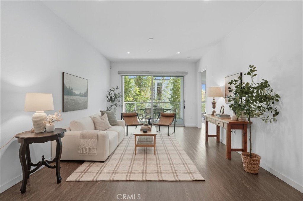Experience the pinnacle of modern coastal living in this private end-unit at the highly sought-after X67 Lofts in Marina Del Rey. This expansive 2-bedroom, 2.5-bath residence spans 1,569 square feet and showcases an open-concept design that’s ideal for both everyday living and effortless entertaining. Inside you will find high ceilings, wide-plank designer flooring, and sleek European cabinetry. The chef’s kitchen impresses with a large center island, premium appliances, including a newer refrigerator, and a seamless flow into the dining and living spaces. Expansive sliding glass doors invite you to a tranquil private balcony, blurring the line between indoor and outdoor living.
The primary suite is a true retreat, featuring luxury custom California Closets, a spa-inspired ensuite with dual vanities, and thoughtfully designed finishes. The secondary bedroom and bath offer versatility and comfort, perfect for guests or a stylish home office.
Additional highlights elevate the lifestyle: remote-controlled Hunter Douglas blinds in every room, automatic blackout curtains, a newer washer and dryer with California Closet cabinets for prime organization, and two tandem parking spaces.
The X67 Lofts deliver resort-style amenities, including concierge service, a state-of-the-art fitness center, pool, BBQ courtyard, lounge areas, and a dog run. Other amenities include 2 EV chargers, video call box for visitor entry into the building, and keyless facial recognition for residents. High-speed (500MB) Internet is included in the monthly HOA dues. Set in the heart of the vibrant Marina Arts District, you’re surrounded by chic cafés, boutique shops, and acclaimed dining. With Abbot Kinney, Venice Beach, and the marina waterfront just minutes away, this home effortlessly blends coastal sophistication with the convenience of city living.