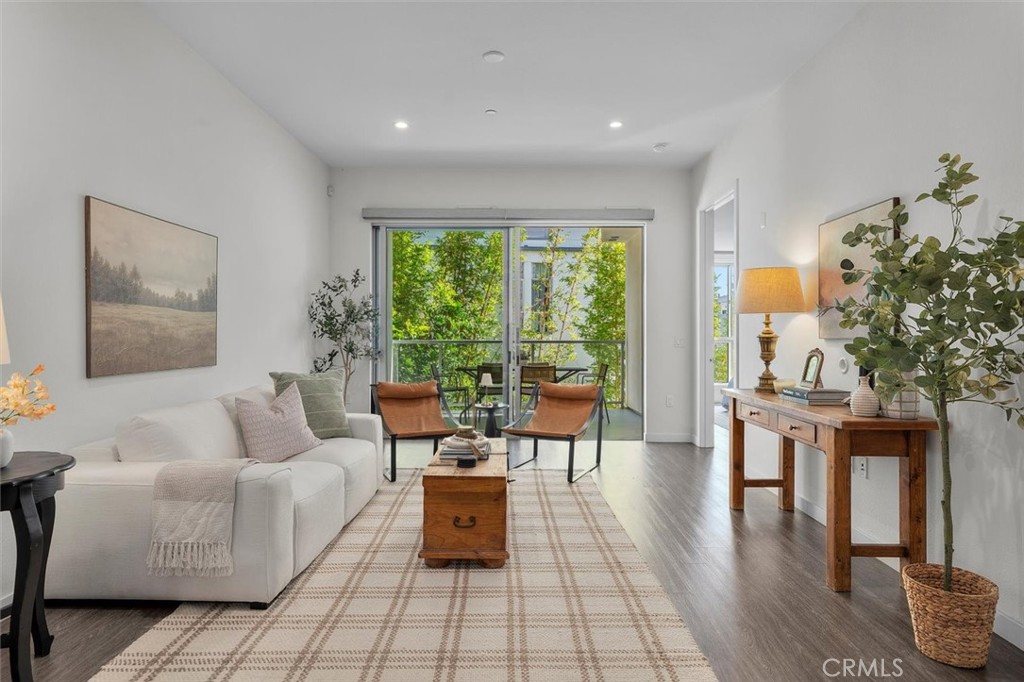 Experience the pinnacle of modern coastal living in this private end-unit at the highly sought-after X67 Lofts in Marina Del Rey. This expansive 2-bedroom, 2.5-bath residence spans 1,569 square feet and showcases an open-concept design that’s ideal for both everyday living and effortless entertaining. Inside you will find high ceilings, wide-plank designer flooring, and sleek European cabinetry. The chef’s kitchen impresses with a large center island, premium appliances, including a newer refrigerator, and a seamless flow into the dining and living spaces. Expansive sliding glass doors invite you to a tranquil private balcony, blurring the line between indoor and outdoor living.
The primary suite is a true retreat, featuring luxury custom California Closets, a spa-inspired ensuite with dual vanities, and thoughtfully designed finishes. The secondary bedroom and bath offer versatility and comfort, perfect for guests or a stylish home office.
Additional highlights elevate the lifestyle: remote-controlled Hunter Douglas blinds in every room, automatic blackout curtains, a newer washer and dryer with California Closet cabinets for prime organization, and two tandem parking spaces.
The X67 Lofts deliver resort-style amenities, including concierge service, a state-of-the-art fitness center, pool, BBQ courtyard, lounge areas, and a dog run. Other amenities include 2 EV chargers, video call box for visitor entry into the building, and keyless facial recognition for residents. Set in the heart of the vibrant Marina Arts District, you’re surrounded by chic cafés, boutique shops, and acclaimed dining. With Abbot Kinney, Venice Beach, and the marina waterfront just minutes away, this home effortlessly blends coastal sophistication with the convenience of city living.