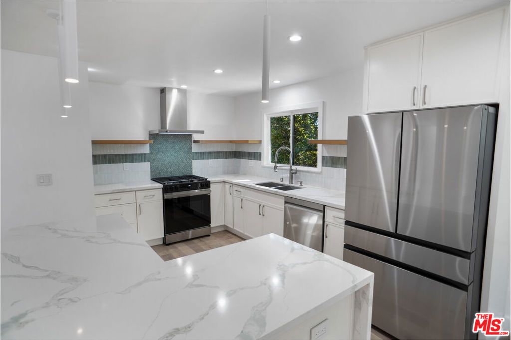 Photo of 9615 Highland Gorge Drive, Beverly Hills, CA 90210 (MLS # 26638917)