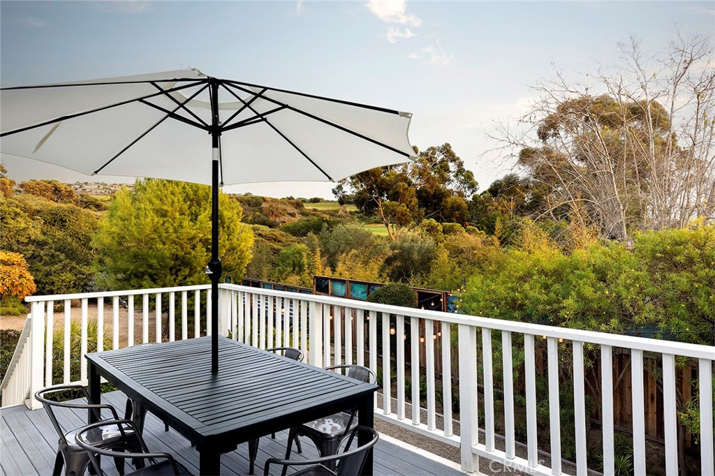 FULLY FURNISHED LEASE AVAILABLE FOR IMMEDIATE OCCUPANCY THROUGH APRIL 1, 2026. In a tranquil setting overlooking Pelican Hill Golf Course’s 9th hole with peek-a-boo ocean views, this charming single-level residence is stylishly furnished and move-in ready. The 3bd/2.5ba home boasts an ideal open floor plan, including a white-and-bright kitchen with informal den and dining area and a large great room with wood burning fireplace and plantation shutters. Three bedrooms line the home’s hallway: the secondary bedrooms have queen beds and share a Jack-and-Jill bath with shower-tub combo; the large en suite primary bedroom features a Cal king bed and walk-in closet. Perhaps most notably, however, is the property’s expansive lot – nestled amongst the trees and one of only a handful that backs to a path along the golf course. The result is the rare combination of scenic privacy and close proximity to Corona del Mar Village and its beaches. Additional home features include interior laundry, wet bar, large entertaining patio and two-car garage.
Corona Highlands residents enjoy access to the community’s private beach and lookout point shared with Shore Cliffs, in addition to a private walkway to Little Corona State Beach. The community is located within short distance to the shops and restaurants of Corona del Mar Village, Crystal Cove, Pelican Hill Resort, and Fashion Island. *Landlord willing to consider tenant concessions if requested in offer*