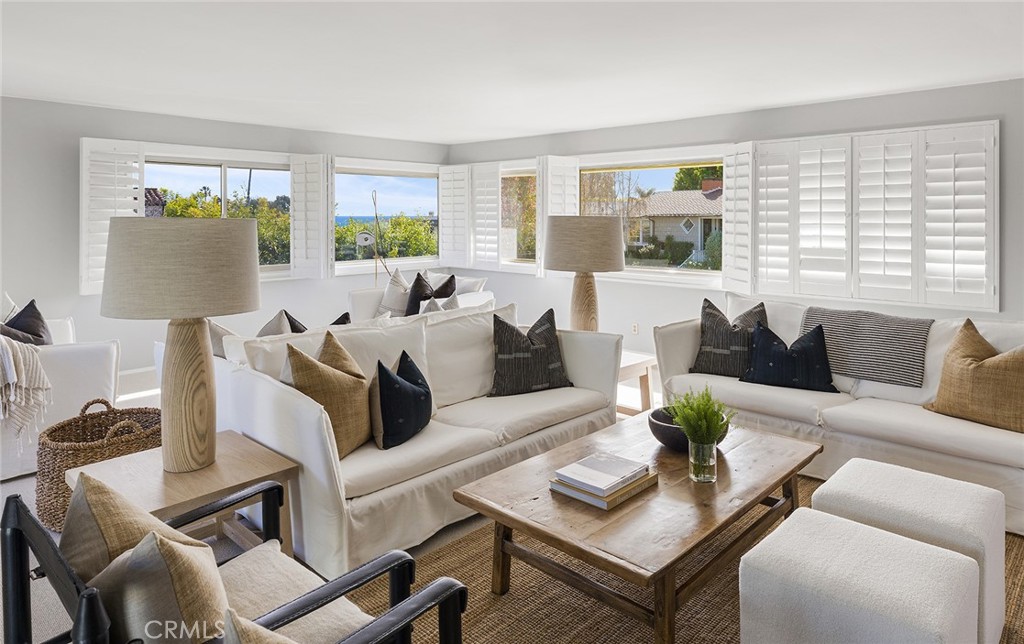 FULLY FURNISHED LEASE AVAILABLE FOR IMMEDIATE OCCUPANCY THROUGH APRIL 1, 2026. In a tranquil setting overlooking Pelican Hill Golf Course’s 9th hole with peek-a-boo ocean views, this charming single-level residence is stylishly furnished and move-in ready. The 3bd/2.5ba home boasts an ideal open floor plan, including a white-and-bright kitchen with informal den and dining area and a large great room with wood burning fireplace and plantation shutters. Three bedrooms line the home’s hallway: the secondary bedrooms have queen beds and share a Jack-and-Jill bath with shower-tub combo; the large en suite primary bedroom features a Cal king bed and walk-in closet. Perhaps most notably, however, is the property’s expansive lot – nestled amongst the trees and one of only a handful that backs to a path along the golf course. The result is the rare combination of scenic privacy and close proximity to Corona del Mar Village and its beaches. Additional home features include interior laundry, wet bar, large entertaining patio and two-car garage.
Corona Highlands residents enjoy access to the community’s private beach and lookout point shared with Shore Cliffs, in addition to a private walkway to Little Corona State Beach. The community is located within short distance to the shops and restaurants of Corona del Mar Village, Crystal Cove, Pelican Hill Resort, and Fashion Island. *Landlord willing to consider tenant concessions if requested in offer*