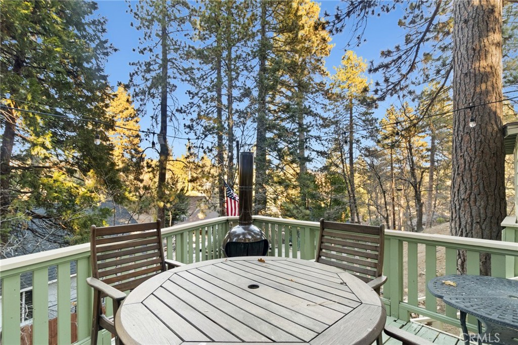 TRULY ADORABLE CABIN IN THE WOODS. THERE ARE 2 BEDROOMS AND 1 FULL BATH, PLUS A STANDALONE EXTRA BEDROOM? OFFICE? STORAGE? WHAT EVER YOU NEED IT FOR, BUYER WILL NEED TO DO OWN DUE DILIGENCE NEWER DUAL PANE WINDOWS AND SKY LIGHT! WOOD BURNING FIREPLACE, WASHER AND DRYER AND REFRIGERATOR STAY. THE BEAUTIFUL DECK/PATIO AREA ARE GREAT FOR ALL OUR OUTDOOR NEEDS. THIS IS A GREAT SIZED LOT WITH A DRIVEWAY THATS IS ON AN UPSLOPE. THIS IS UPDATED AND REMODELED WITH COVERED SHED AREA TOO! CLOSE TO ALL THE HIJKING AND BIKING, NOW VALLEY, SANTAS VILLAGE AND MORE! SELLER MAY HELP WITH SOME CLOSING COSTS.