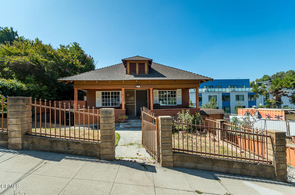 Welcome to 2132 Branden st in Los Angeles. This zoned LAR3 property consists of 3 addresses all on one parcel. 2132 is the front house that is 2 bedrooms 1 bath. 2134 is a 1 bed 1 bath unit to the left in back. 2136 is another 1 bed 1 bath unit to the right in back. All units are vacant and have additional storage underneath. The old carriage house / garage has a small workshop in the back section. This is 'an investors dream' or perfect for the multigenerational family wanting to restore this property to its original craftsman charm. All units have separate gas and electric meters. The lot just to the south, which is a little smaller, has been developed and has several million-dollar plus condos. The possibilities are endless. Fix it up and have the whole family move in, restore it and live in the front and rent out both back units, rehab the property and have 3 rental units, do the 'leg work' for a complete flip and sell, or go the whole distance and develop this into a money-making machine. This area of Los Angeles is undergoing a 'revamp' as you can see from some of the photos. This is close to Dodger Stadium, Downtown LA, Echo Park, and not far at all from Glendale, the Zoo, & downtown Burbank. Come check out this opportunity before it is missed.
