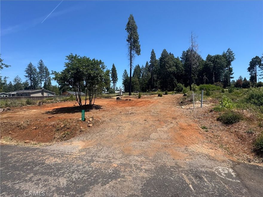 Ready to build your dream home? Discover this exceptional 0.26-acre lot in Magalia, thoughtfully cleared down to the dirt—ready for your building plans with no additional cleanup required. This generous parcel offers plenty of space to create your ideal home and enjoy outdoor living. Located within the desirable Paradise Pine Property Association, residents enjoy access to community amenities including a swimming pool, BBQ area, clubhouse, and more. Conveniently situated near shopping, and dining, this property combines comfort, community, and convenience. For more information, please contact us today.