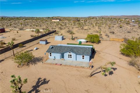 Photo of 59260 Sunflower Dr, Yucca Valley, CA 92284 (MLS # CV25265881)