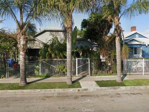 Photo of 5611 S Normandie AVE, Los Angeles, CA 90037 (MLS # PW26181859)