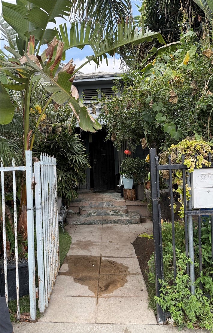 Photo of 5611 S Normandie AVE, Los Angeles, CA 90037 (MLS # PW26181859)