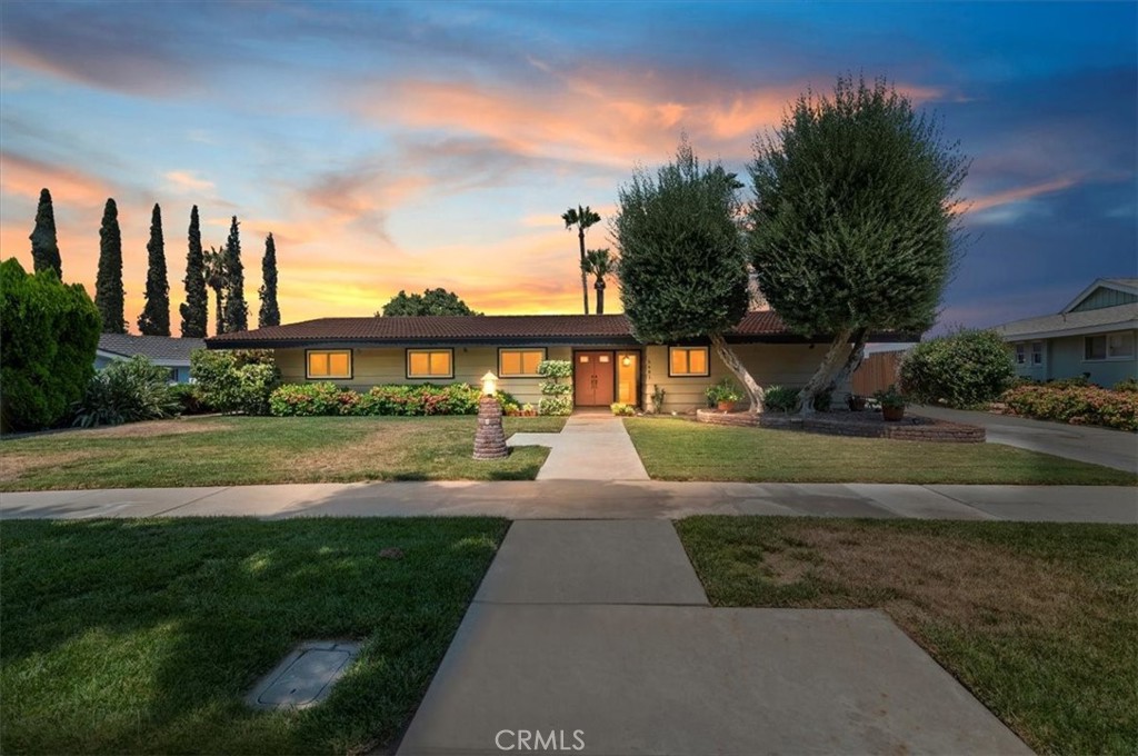 *POOL WITH A VIEW*Welcome to this stunning mid century ranch home nestled in the highly sought after Grand neighborhood of Riverside. With 4 spacious bedrooms, 2 updated bathrooms, and 1,752 square feet of timeless charm, this home offers the perfect blend of character and comfort. Step inside to discover gorgeous beamed ceilings, large windows that fill the space with natural light, and a seamless connection to the outdoors. The beautifully landscaped grounds lead to your own private backyard retreat featuring a sparkling pool and breathtaking views, perfect for relaxing or entertaining. Located in one of Riverside’s premier neighborhoods, this home offers not only style and serenity but also unmatched convenience and community. This is your chance to own a piece of Riverside history with all the modern comforts you love.
