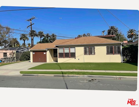 Photo of 3117 Oakwood Avenue, Lynwood, CA 90262 (MLS # 26104733)