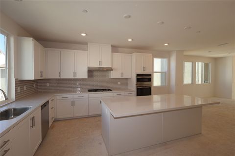 Photo of 26998 Echo Mountain Way, Valencia, CA 91381 (MLS # OC25261113)