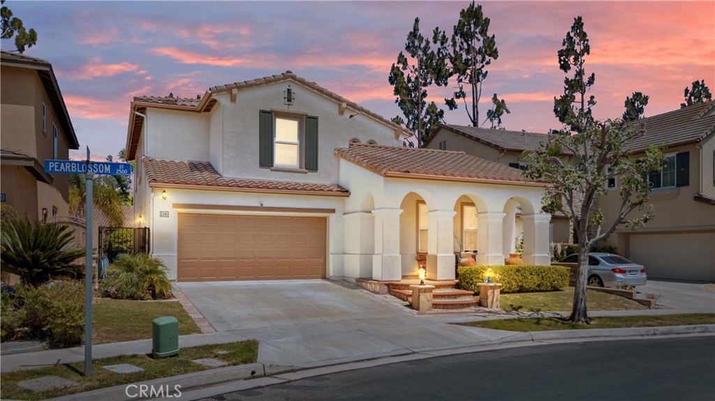Stunning 4-Bedroom Home in the Highly Sought-After Gated Community of the Aspens at Turnleaf, one of Fullerton’s most desirable gated enclaves! This property is ideally located within the award-winning Beechwood K-8 School District, and just moments from the Fullerton Sports Complex and The Loop recreational trails. From your backyard and upstairs windows, enjoy the sights and sounds of community life, sunset views, summer concerts in the park, youth sports games, and migrating birds passing through on the breeze. The floorplan features a flexible downstairs den/optional 5th bedroom adjacent to a full bathroom, perfect for guests, in-laws, or a home office. From the moment of entry, you are greeted by a gorgeous staircase & abundant lighting throughout. Gold hardware & gold fixtures continue through the home. The light and bright kitchen offers an abundance of counter space, quartz countertops with custom tilework and opens to the oversized family room, creating a welcoming environment for gatherings and day-to-day living. Upstairs, the expansive primary suite is a true sanctuary with dual walk-in closets and a luxurious bathroom complete with a soaking tub, walk-in shower, and separate vanities. Secondary bedrooms are generously sized, and the thoughtful layout includes ample linen storage and upstairs laundry. Step outside to the private backyard, where you’ll find lush landscaping, stamped concrete hardscape, and space for outdoor dining or future enhancements. Residents of Turnleaf enjoy exclusive access to resort-style amenities including two sparkling pool and spa complexes, three tot lots, private parks, and unbeatable proximity to top-tier schools, Downtown Fullerton, Downtown Brea, shopping, dining, golf, hospitals, and freeway access. Don’t miss your chance to call 2580 Pearblossom your home. This one checks all the boxes - Location, layout, lifestyle, and community.