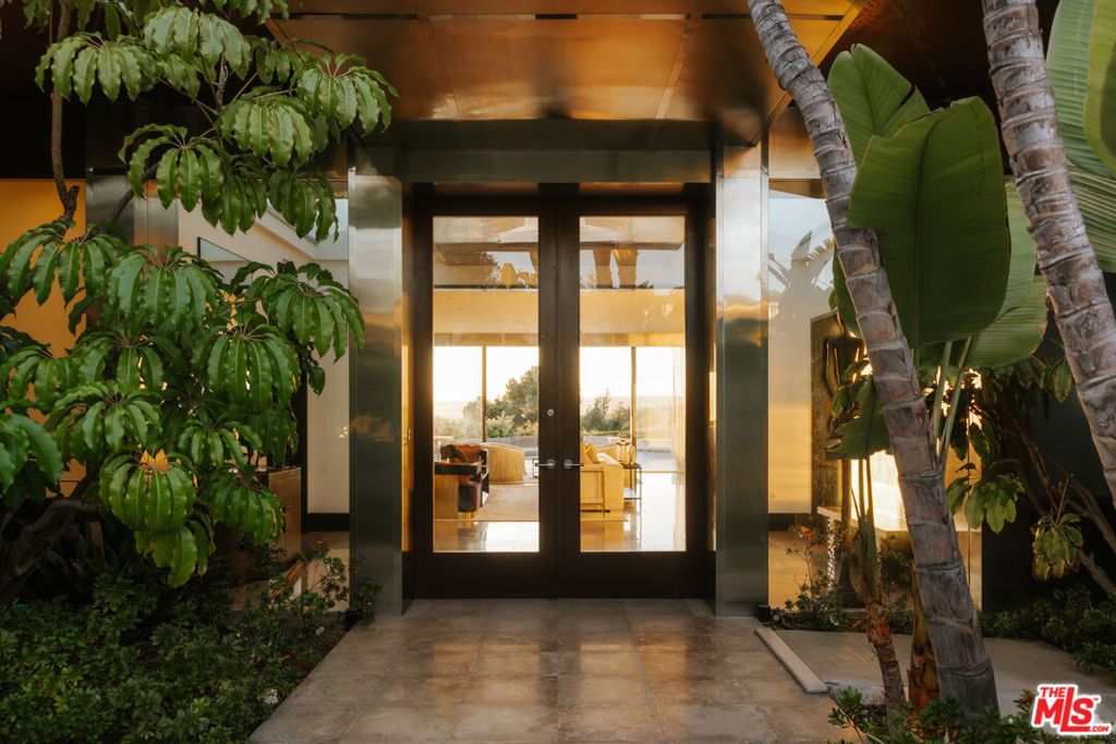 Photo of 301 Trousdale Place, Beverly Hills, CA 90210 (MLS # 26633807)