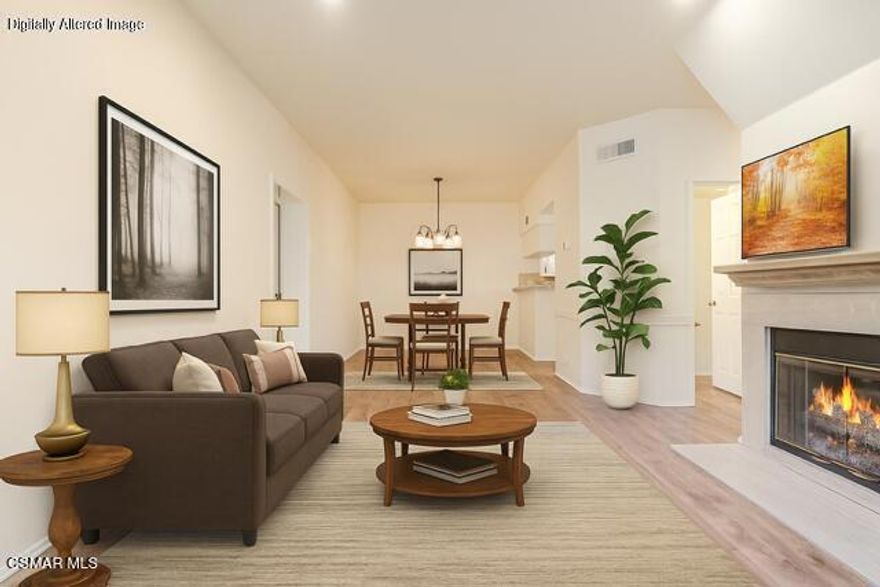 Beautifully updated and highly desirable end unit townhome in sought after Oak Park. This bright and spacious 2 bed 3 bath home offers an open floor plan with high ceilings, a cozy fireplace, light wood like flooring and an outdoor flow to a patio surrounded by lush greenery. The modern kitchen features granite counters, stainless steel appliances, and a breakfast bar. Upstairs are two bedrooms with upgraded ensuite bathrooms, each has a balcony, high ceilings, lots of natural light and a walk in closet. This home also has rare direct access to the garage. An additional assigned covered parking spot is included. Shadow Ridge amenities include 2 pools, 2 spas, 24-hour gym, sauna, racquetball court, tennis courts, sand volleyball, clubhouse, and walking trails.HOA covers trash and basic cable/internet. Close to parks, shopping, hiking, dining, and top rated Oak Park schools.