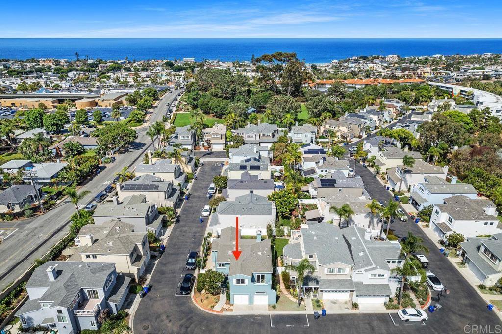 Detached beach home in coveted North Shore community West of I-5 off D Street near downtown Encinitas, library, city park and Coaster Station. This move-in ready home has been recently painted inside & out. It has 1st floor spacious living room, dining room, kitchen, powder room & laundry room, all with gorgeous new vinyl plank flooring. The bright, open layout welcomes you with high ceilings, lots of windows and a natural flow to the nice secluded yard. Upstairs offers 3 bedrooms with new plush carpeting & 2 full baths with new vinyl plank floors. The primary suite bathroom has double sink vanity, walk-in closet and adjoining dressing area featuring vanity counter, bathtub & separate shower room. The attached bedroom sun deck has a peak ocean view. The 2 additional bedrooms offer space for family, guests or remote work area and 1 has a view deck. The homes location is just a few blocks from restaurants, shops, cafes and popular beaches. Grab your surfboards or bikes and make this home your own piece of paradise.