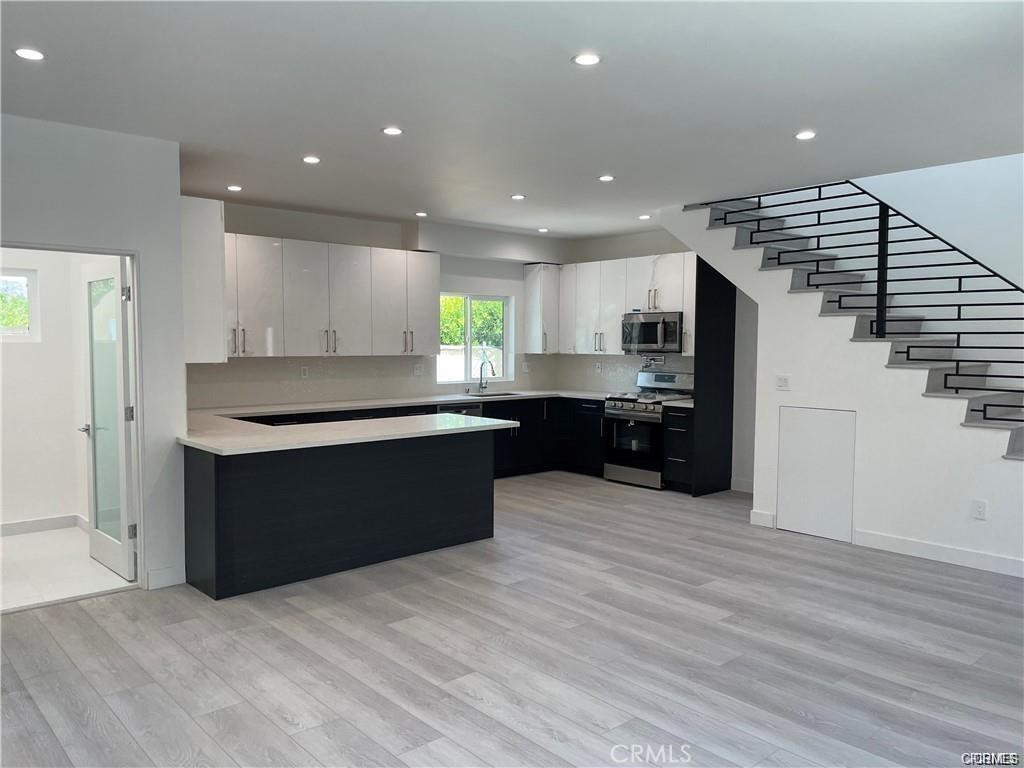 NORTHRIDGE, BUILT IN 2021 WITH METICULOUS CARE AND ATTENTION TO DETAILS,THIS 2 STORY, 2BED+2.5 BATH HOME HAS TWO MASTER SUITES WITH OWN BATHROOMS AND PRIVATE BALCONIES. NEW WOOD LIKE FLOORING. CHEF’S KITCHEN WITH STAINLESS STEEL APPLIANCES, QUARTZ COUNTER TOPS AND PLENTY OF CABINET SPACE, SPACIOUS LIVING ROOM . BATHROOMS WITH TILE FLOORING AND QUARTZ COUNTER TOPS. RECESSED LIGHTING THROUGHOUT. SEPARATE LAUNDRY ROOM WITH WASHER & DRYER. 2 CAR PARKING SPACE WITH PRIVATE GATE. LOCATED CLOSE TO CSUN, GRANADA HILLS CHARTER HIGH, NOBEL CHARTER JR HIGH AND TOPEKA CHARTER ELEMENTARY.