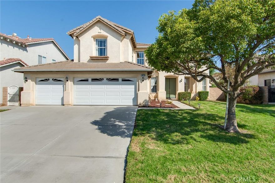 Spacious Eastvale beauty with gorgeous remodeled kitchen. Enter the bright formal living area, boasting soaring ceilings, and an adjoining formal dining space—perfect for entertaining. At the heart of the home, the family room and updated kitchen shine with beautiful quartz countertops, a waterfall island, built-in wine fridge, and ample cabinet space for all your culinary needs.

The first floor also includes a bedroom with an attached bathroom, ideal for multi-generational families, and a well-equipped laundry room with a sink.

Upstairs, you'll find four additional bedrooms and a versatile loft area. The expansive master suite is a luxurious retreat, complete with its own fireplace and a beautiful en-suite bathroom, featuring dual master closets, a water closet, a separate shower and tub, and two distinct vanity areas.

Outside, enjoy well-manicured front and back lawns, along with a 3-car garage that opens to the backyard, providing additional private parking.

This home perfectly combines style and practicality, designed to cater to all your lifestyle needs.