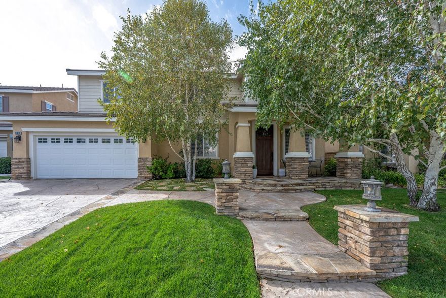 Stunning 5-Bedroom Home in Tesoro Highlands – Valencia



Welcome to this beautifully upgraded 5-bedroom, 3-bathroom home located in the highly sought-after Tesoro Highlands neighborhood of Valencia. This spacious and well-appointed residence features custom built-ins, elegant stone countertops, and high-end appliances throughout.



Enjoy the flexibility of a 3-car tandem garage and an oversized bonus room on the second floor—perfect for a home theater, playroom, or additional living space. The primary suite boasts a private balcony, updated bathroom with soaking tub, offering a peaceful retreat with views.



Step outside to your backyard oasis featuring beautiful city lights views, a built-in BBQ, a custom outdoor fireplace, and a stylish seating area—ideal for entertaining.



Conveniently located near top-rated schools, scenic hiking trails and parks, shopping, the 5 Freeway, Magic Mountain, and the Castaic Lake Recreation Area, this home truly has it all.



Don't miss your chance to own this exceptional home in one of Valencia’s premier communities!

**Professional photos coming soon