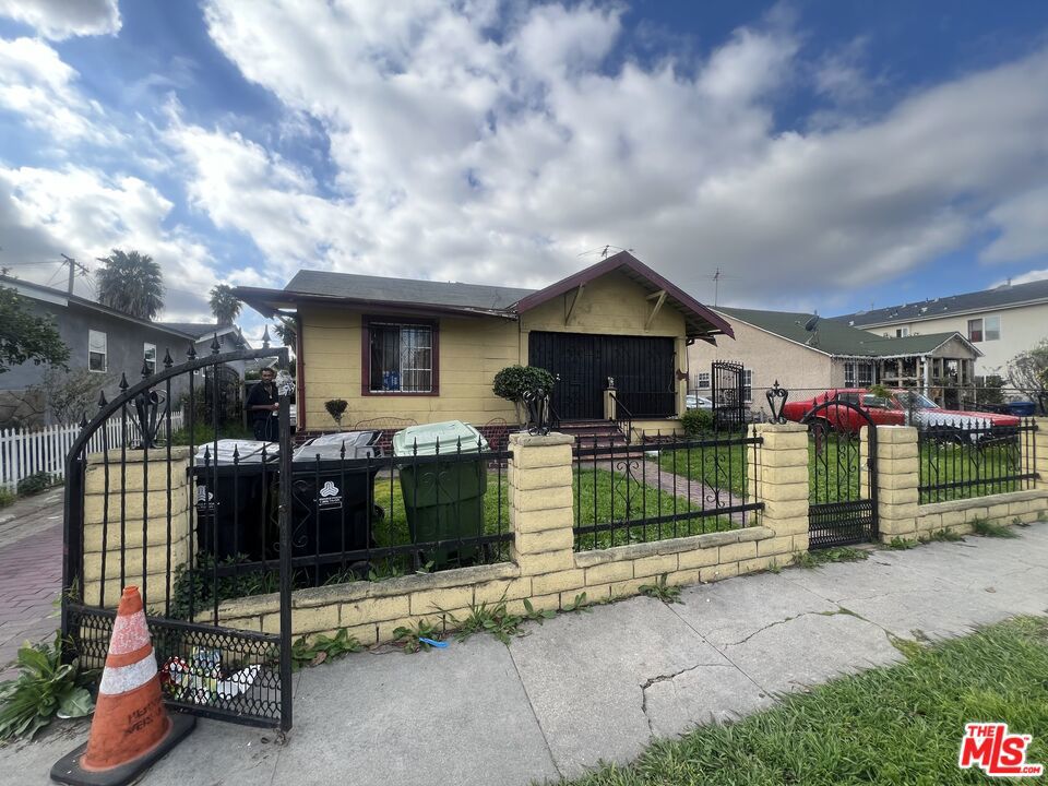 Look at This charming 2-bedroom, 1-bath home is located in an amazing neighborhood and offers incredible potential. MOVE IN ASAP. The property sits on a generously sized lot, zoned LAC2, opening the door to development or expansion opportunities (buyer to verify). Features include: Detached garage ideal for a possible ADU conversion. Spacious yard perfect for entertaining, gardening, or future development, situated in a highly desirable area with strong appeal.