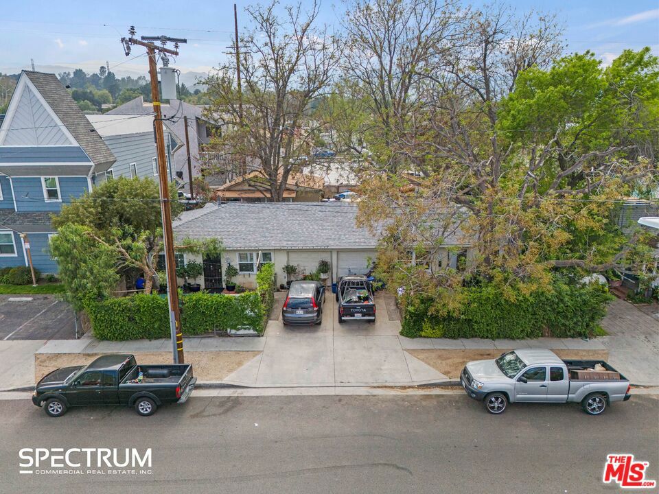 Prime Investment or Redevelopment Opportunity!This rare gem is a standout in the heart of the highly sought-after Downtown Newhall! Set on a generous 9,390 square foot lot, this property boasts both a charming single-family home and a duplex, offering endless possibilities for savvy investors or those seeking an owner-occupied income-generating opportunity. Located just steps away from trendy restaurants, boutique shopping, top-tier hotels, and state-of-the-art fitness centers, this property offers unbeatable convenience and access. With seamless connections to the 5 & 14 freeways, you'll be perfectly positioned for all that this vibrant area has to offer. Nestled within the Old Town Newhall Corridor Zone and zoned SCSP, this property is primed for maximum return on investment, especially with current rents well below market value. Whether you're looking to live in one unit while collecting rental income from the others or want to capitalize on the area's explosive growth with a pure investment, the potential here is undeniable. The lot spans three addresses 24513, 24515, and 24519 and currently houses three long-term tenants, making this an income-producing opportunity from day one. Don't miss your chance to secure a foothold in one of Newhall's hottest locations.