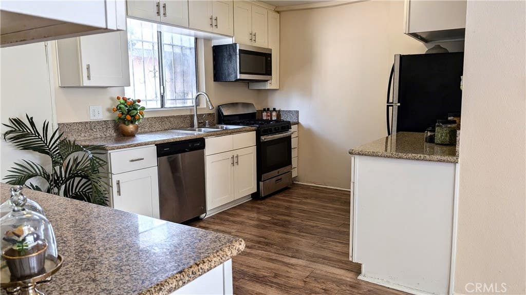 Photo of 3854 Arlington Avenue, Los Angeles, CA 90008 (MLS # TR26140567)