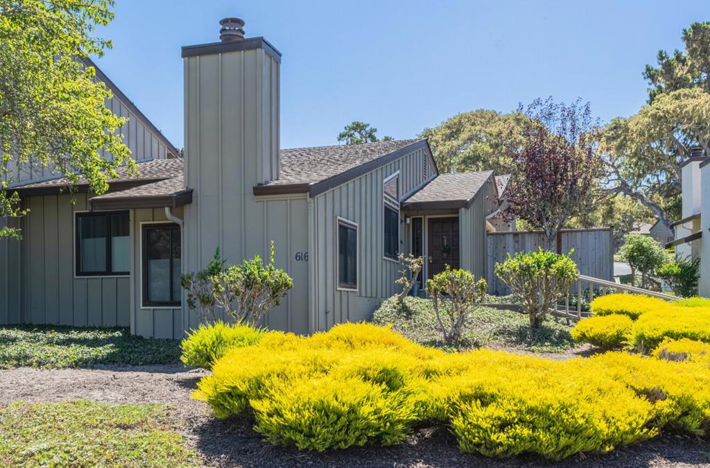 Destination location! Affectionately known as Butterfly Town, USA, this single-level condo in the heart of Pacific Grove provides desirable conveniences including a full-size in-unit laundry, ample storage space, and a roomy two-car garage. Easy parking at the front and garage entrance make 616 Sage Court's location a prime feature in the Forest Grove Community. This light-filled 2-bedroom, 2-bath home offers 1,130 sq. ft. of comfortable living in a tranquil, easy-maintenance setting. The dining room opens to a private patio perfect for intimate gatherings, morning coffee, or dining al fresco. Inside, natural light fills the living room, where you can curl up by the fireplace with a good book or stretch out and relax in the spacious living room. The generous primary suite features a full en-suite bath, while the second bedroom offers flexibility and opens to its own private patio. All of this close to the Pebble Beach Country Club Gate entrance, Rip Van Winkle Park, Asilomar State Beach, grocery stores, coffee shops, top-rated schools, and more. Move right in and fall in love with the Pacific Grove lifestyle!