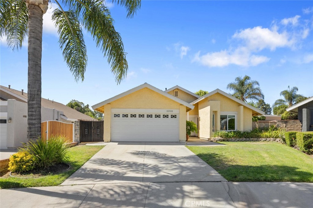 Beautifully updated! 22922 Magnolia Glen is a single-story gem in the heart of Valencia. This 4-bedroom, 2-bathroom home offers 1,624 square feet of living space and sits on a large wraparound backyard, perfect for entertaining, outdoor play, or simply relaxing in the California sunshine.
Inside, you’ll find a bright and inviting floor plan with modern upgrades throughout. The home features recessed lighting, smooth ceilings and walls, custom baseboards, and stylish laminate wood flooring. The kitchen has granite countertops, white cabinetry, custom shelves and stainless steel appliances A newer dual-pane sliding door opens directly to the backyard, creating a seamless indoor-outdoor living experience.
Additional highlights include a newer roof, upgraded central air conditioning and heating, and dual-pane windows for comfort and efficiency year-round.
Best of all, this home has no HOA and no Mello-Roos, making it a rare find in one of Valencia’s most desirable neighborhoods.
This is a wonderful opportunity to own a beautifully maintained single-story home with modern touches in a prime Valencia location.