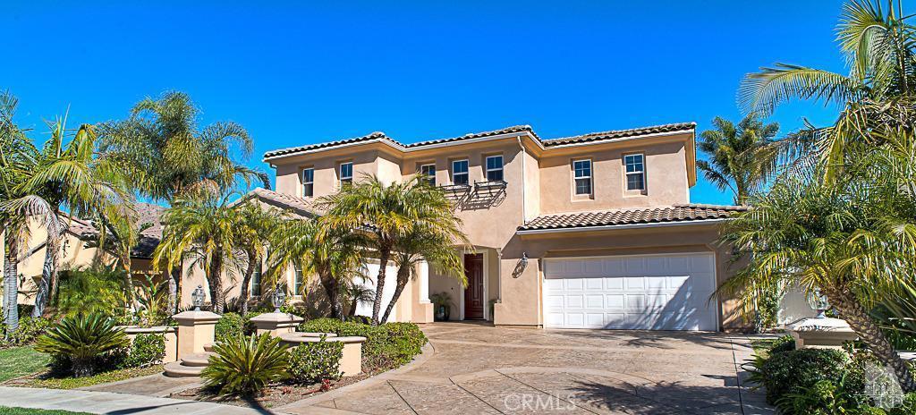 Spectacular! Premium lot . . . Highly upgraded and absolutely impeccable throughout, this 5 bed.(one suite down)+ 4.5 bath home features privacy and unobstructed mountain and valley VIEWS. Impressive added architectural detail throughout includes custom arched doorways, replaced windows & casings, French doors, wainscoting, crown molding, built-in media center, loft library/office and more. Marble surrounded fireplace enhance the living room adjacent formal dining room. Gourmet stainless and granite enhanced kitchen with generous island features both bar and spacious informal dining. Stunning master retreat with spectacular views includes the generous travertine enhanced bath and closet area. All baths feature tasteful upgrades. Oversized windows and doors draw one to the grand fountain en