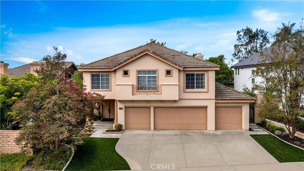 Outstanding Pacific Hills Home! This exceptional residence offers a rare four-car garage, four spacious bedrooms plus a versatile loft that can easily convert into a fifth bedroom, and three full bathrooms. Inside, you’ll find soaring ceilings, stunning hardwood floors throughout the downstairs, brand-new luxury vinyl plank flooring upstairs, and new carpet on the stairs. The large primary suite is filled with natural light and features an oversized walk-in closet, a spa-inspired bathroom with a separate soaking tub and walk-in shower, creating the perfect private retreat. Set on a large private lot, the home also offers a flat backyard—ideal for entertaining, play, or future customization. Meticulously maintained by its original owner, this property reflects true pride of ownership. Conveniently located near award-winning schools, shopping, dining, and freeways. Plus, enjoy the added lifestyle bonus of Lake Mission Viejo membership, with beaches, boating, and community events. A perfect blend of space, style, and location—this one won’t last!
