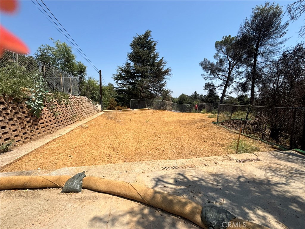 Nestled in the scenic hills of Chaney Trail in Altadena, this 29,000 sq ft vacant lot offers an incredible opportunity. Build your dream home or develop units for income property on this fully cleared land. The property features breathtaking views of the Pacific Ocean, allowing you to enjoy a peaceful, serene hillside setting while being just a short drive down to the city.