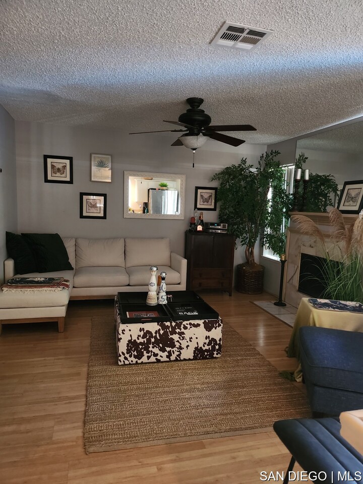 Townhome features ceiling fans throughout. Upstairs has new carpeting, two bedrooms featuring customized closets, refinished showers, hard surface flooring downstairs. Contingent Sale Sale is contingent upon seller finding a new home.