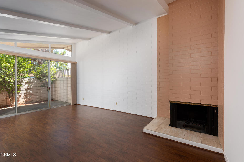 This mid-century condo offers the perfect blend of modern amenities and classic charm. Located in a highly sought-after central area of Alhambra, this light-filled home boasts high ceilings that create a spacious, open atmosphere. With updated flooring throughout, the condo features a fireplace, three generously sized bedrooms and two bathrooms, providing ample space for both relaxation and hosting guests. Enjoy year-round comfort with central air and heat, ensuring the ideal temperature no matter the season. Step outside to your private gated patio, a serene retreat perfect for enjoying the outdoors in peace and privacy. Residents also have access to exceptional community amenities, including a sparkling pool, spa, and a clubhouse for social gatherings and events. Whether you're looking to relax in style or stay active with neighbors, this condo provides the perfect setting for a vibrant 55+ lifestyle. Don't miss the chance to make this beautifully maintained home your own!