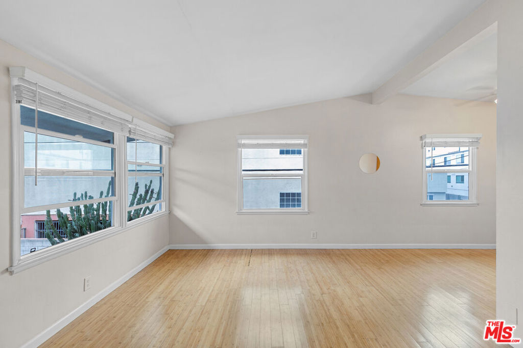 Geeze Louise! Check out this light-filled, top floor 2-bedroom unit that puts you at the hear of everything Mar Vista has to offer. You're just minutes from Downtown Mar Vista, the beloved Farmers Market, and around the corner from local faves like Lodge Bread and Samosa House. Inside, the unit is filled with natural light thanks to vaulted ceilings and large windows throughout. The honey-toned wood floors add warmth and charm, while the updated kitchen features stainless steel appliances that make cooking a breeze. Whether you're prepping dinner or enjoying your morning coffee, the space just feels good to be in. Both bedrooms are roomy and come equipped with ceiling fans to keep the air moving on warm days. The layout offers a nice balance of openness and privacy, with plenty of space to relax or work from home. It's easy to imagine settling in and making this place your own. Pets are welcome here, so bring your furry friend along for the ride. Street parking is easy, but if you'd prefer a designated spot, parking is available for just $50 per month. This is Westside living at its best--bring, breezy and walkable to everything that makes Mar Vista such a great place to be. Come take a look and see if it feels like home.