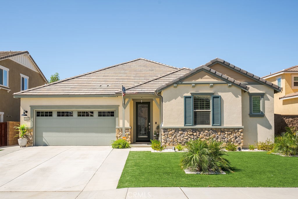 Gorgeous single story home located in beautiful Heritage Lake. This 4 Bed, 3 bath home is like new with upgraded flooring and Plantation shutters. Located in a cul-de-sac this home has great curb appeal. The front lawn is artificial turf with drip system to the flower beds making this very low maintenance and water conserving. Once inside you have a sense of space created by the wide hallway, high ceilings and multitude of windows that let plenty of light in. The secondary bedrooms are located to the front of the home. They are all very spacious and have walk-in closets. This home has a desirable open plan. The great room allows for a generous family room area as well as a dining area. The gourmet kitchen has an oversized center island that offers a lovely breakfast bar. The granite counters compliment the the darker cabinets, of which there are many. The Primary bedroom has a view of the backyard. It is very roomy and has a large walk in closet. The primary bathroom has a separate large shower and tub and dual vanities. The indoor laundry is very convenient. Outside in the backyard, you have a solid patio area and plenty of space for a BBQ. This area is very private. This home comes with PAID OFF solar which is a definite plus. The community of Heritage Lake has several pools, sports courts, parks, BBQ areas, Clubhouse, trails and so much more. Make it a point to view this home and make an offer