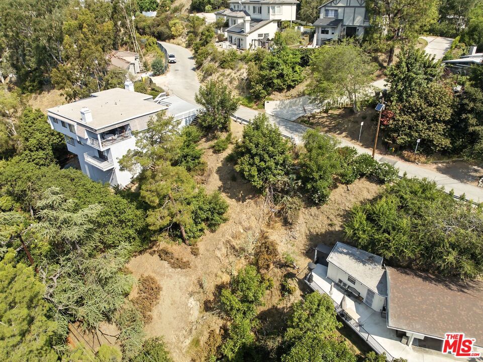 A wonderful opportunity to build your dream home with stunning views near the prestigious Chevy Chase Country Club in Glendale. Already made plans exist for a well-appointed 3 bedroom 2,321 sq ft home with 500 sq ft garage and large primary suite with walk-in closet. Nestled in a serene and upscale neighborhood surrounded by multi-million dollar homes, this property offers a peaceful getaway from the hustle and bustle yet keeps you in close proximity to wonderful golf courses, parks, and schools. Perfectly located just minutes from Montrose, downtown Glendale, Eagle Rock & Pasadena. Don't miss the chance to invest or live in one of Glendale's most sought-after areas!