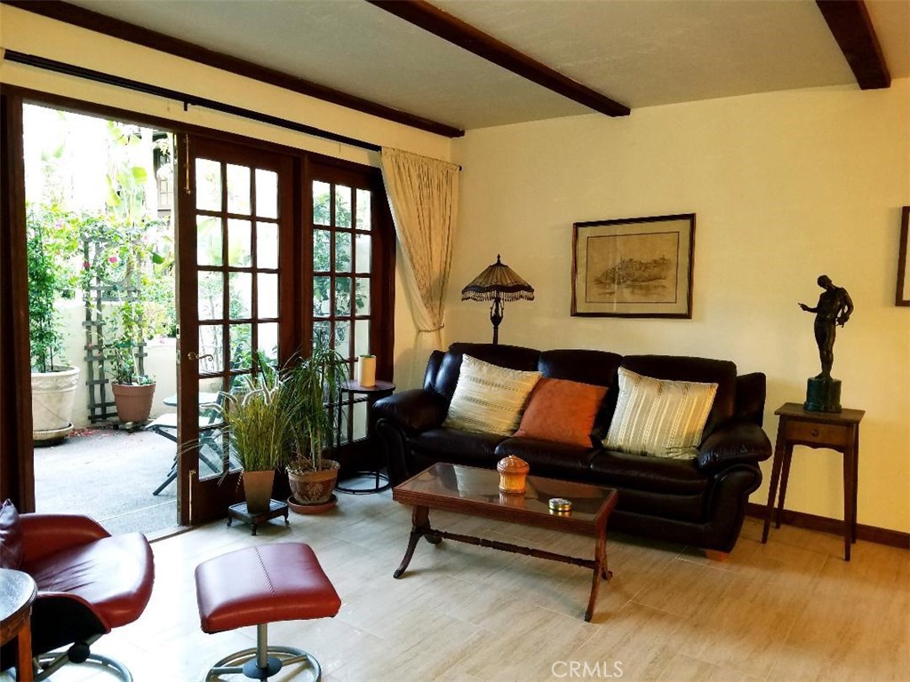 AVAILABLE IMMEDIATELY Beautifully Remodeled Townhome with Scenic Views in the La Jolla Village Complex!
This stunning multi-level townhome features two bedrooms plus a dedicated office ideal for working from home or creating a flexible bonus space. Full of natural light, charm, and privacy, this home offers a thoughtful layout designed for comfortable living.
The spacious primary suite boasts soaring wood-beamed cathedral ceilings, a large skylight, a private balcony, generous closet space, and a secluded scenic view.
The secondary bedroom and full bath are located on the opposite side of the home for added privacy perfect for guests or housemates.
The open-concept floor plan includes a bright and airy living room with atrium-style doors leading to a private patio with beautiful east-facing views. With no neighbors above, below, or directly in front, you'll enjoy peace and privacy throughout.
Outdoor living is made easy with a large deck off the kitchen, a main-level patio, and an upper-level balcony ideal for relaxing or entertaining.
Features include:
Oversized 2-car garage with built-in storage
Ample guest parking
Full suite of appliances: refrigerator, 4-burner gas cook-top with oven, microwave, dishwasher, washer & dryer
Community amenities: pool, spa, tennis courts, and more!
Location Highlights: Just one block from shops, restaurants, grocery stores, and theaters. Minutes to UCSD, La Jolla's world-class beaches, Scripps Hospital, VA Hospital, Torrey Pines Golf Course, Salk Institute, La Jolla Playhouse, the Biotech Corridor, Scripps Oceanographic Institute & Aquarium, airport and major freeways.
Rental Terms:
Renters insurance
Long-term lease preferred
No smoking, no pets, no subletting
$6,000 security deposit + $150 common area key deposit
Prospective tenants must provide verifiable proof of income equal to or greater than 2.5 times the monthly rent