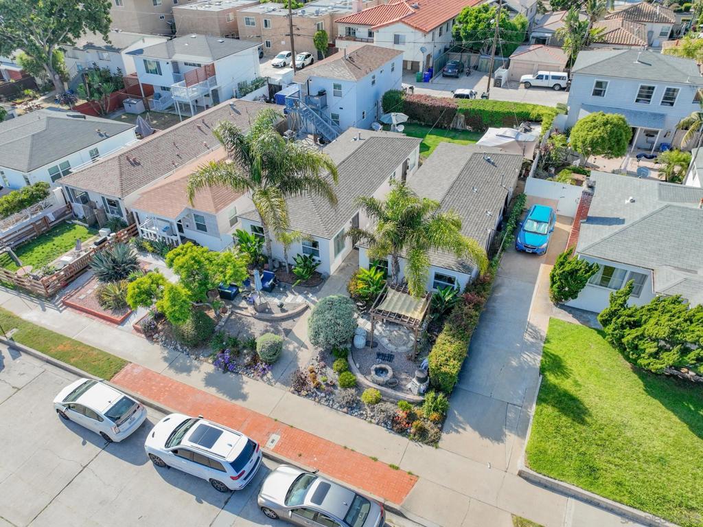 It is a privilege to present for sale 1150-56 Reed Avenue in Pacific Beach! A very well-located four (4) unit property, held by the same family as its original developer for 80+ years! Comprised of all (4) one-bedroom/one-bathroom units (+/-525 SF each), spread across two single story duplexes with pitched roofs and a beachy cottage vibe. Each unit has its own yard or dedicated patio area, and there are four (4) surface off-street parking spaces at the alley. Managed from afar for quite some time, it seems there is upside in operating performance either by way of: 1) a future redevelopment of 3-story structures that would max out rentable building area in this highly coveted location, allowing for much more income once complete and rented as a modern coastal product; 2) modernizing existing units to a degree sufficient to justify higher rents in-line with updated product in the immediate area; or 3) via modernization of existing units and operating (some or all) as short term rental units after any turnovers may occur. Tenants love being within walking distance to the beach (+/-4.5 blocks), Sail Bay (+/-3 blocks), plus dining/nightlife and recreation options abound. Don't miss this opportunity to acquire an underdeveloped lot in such a prized coastal location, with ability to increase current revenue at the current units, while working towards a longer term plan geared towards maxing out density and building square footage eventually.